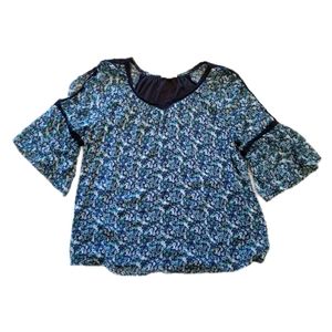 Blue Floral Open Shoulder Top with flutter sleeves and crochet trim in Size 1X